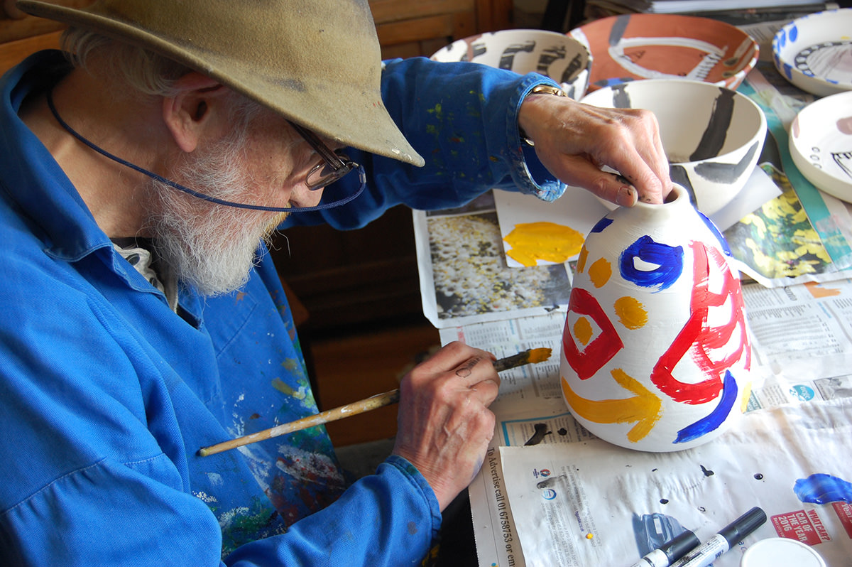 Tony Sheils decorating a Susie Cousins pot